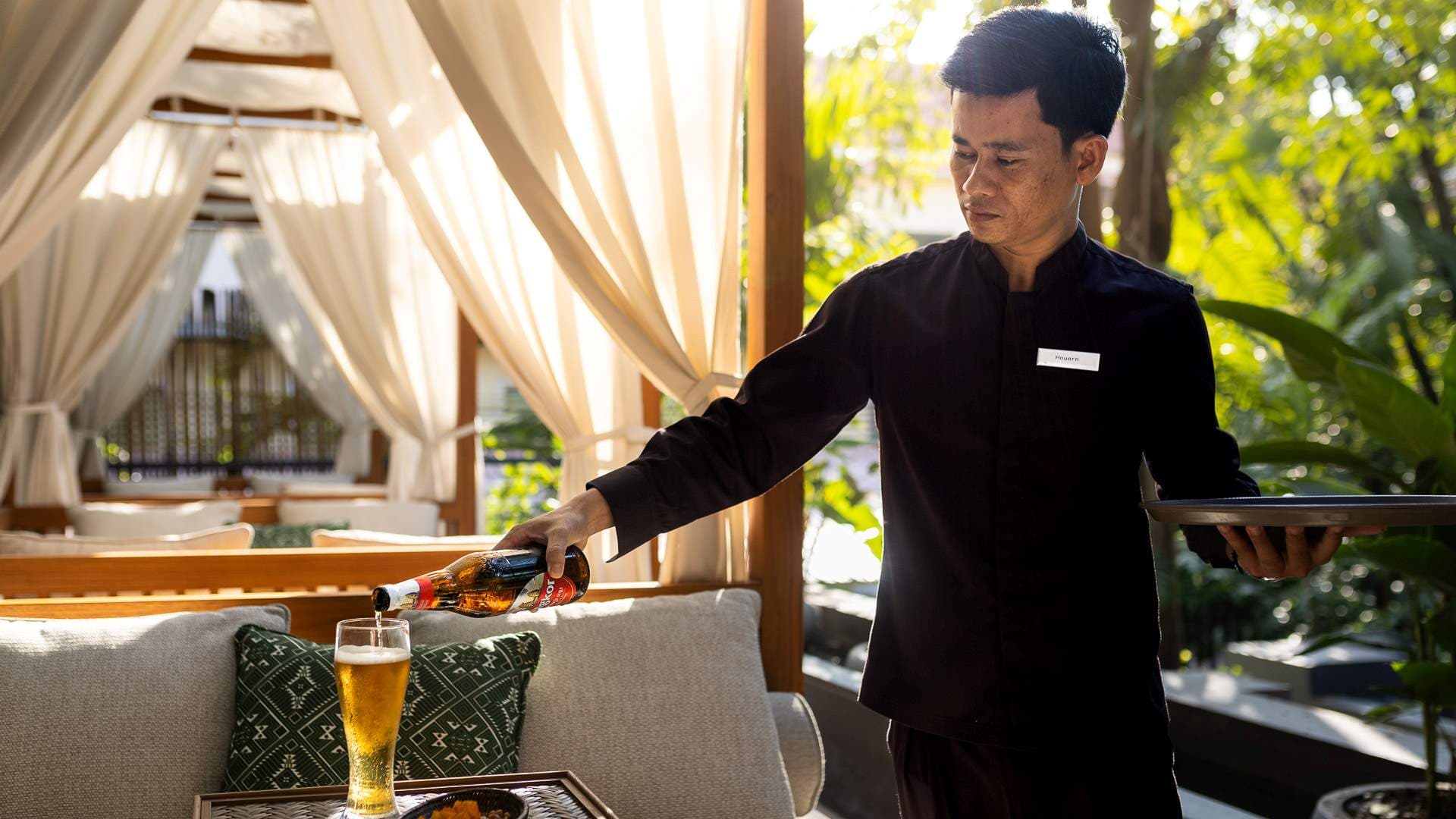Pouring drinks at the bar